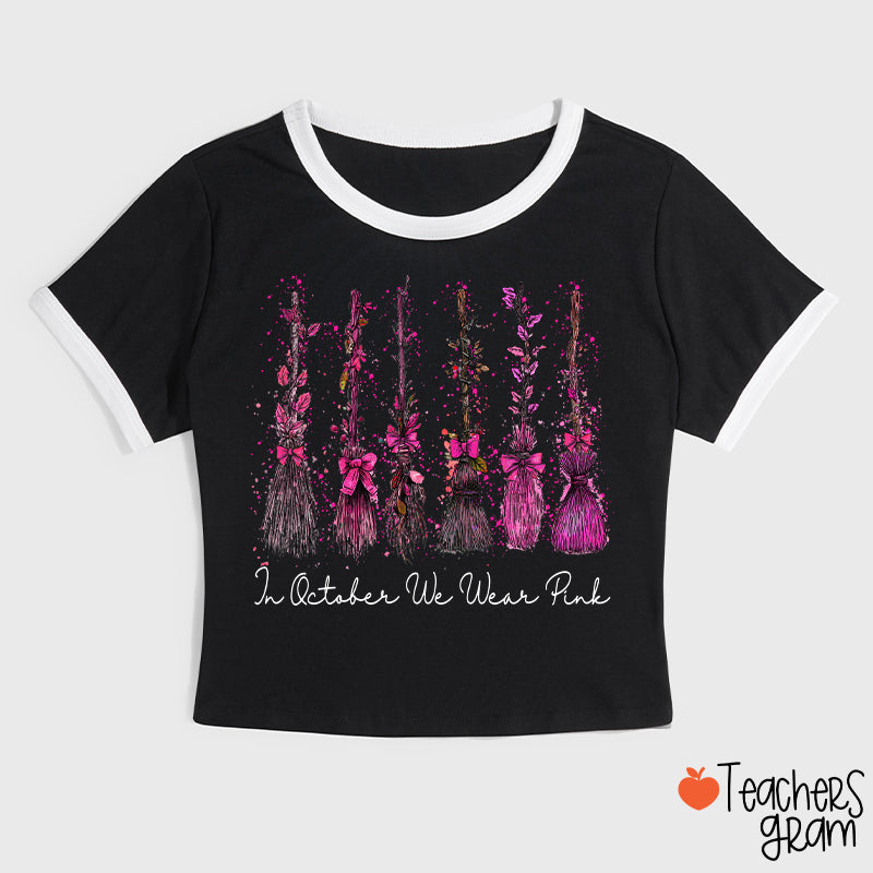 On Wednesday We Wear Pink Witch Broom Teacher Ringer T-Shirt