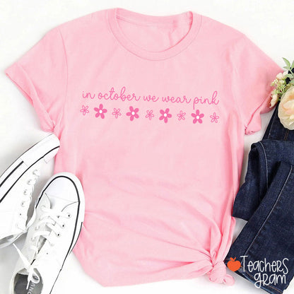 In October We Wear Pink Handwritten Script Daisy Floral Fall Teacher T-Shirt