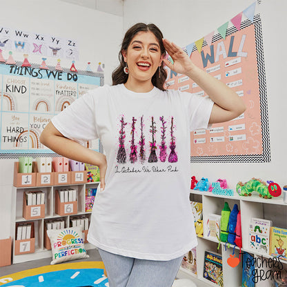 On Wednesday We Wear Pink Witch Broom Teacher T-Shirt