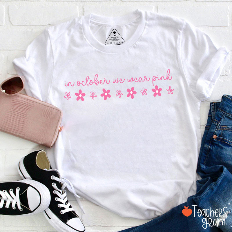 In October We Wear Pink Handwritten Script Daisy Floral Fall Teacher T-Shirt