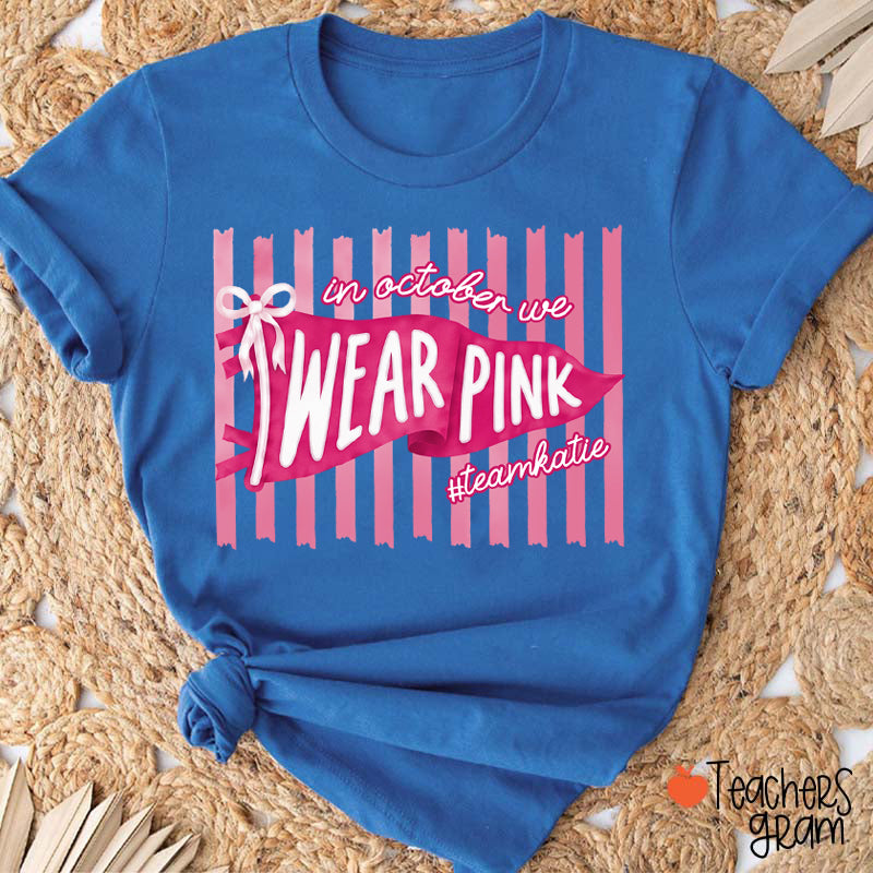 Personalized In October We Wear Pink Pink Stripe Flag Bow Teacher T-Shirt