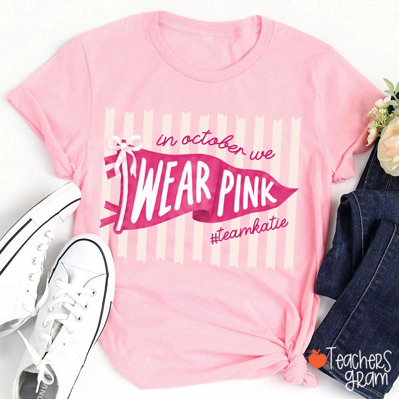 Personalized In October We Wear Pink Pink Stripe Flag Bow Teacher T-Shirt