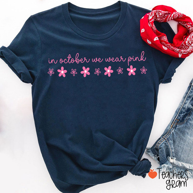 In October We Wear Pink Handwritten Script Daisy Floral Fall Teacher T-Shirt