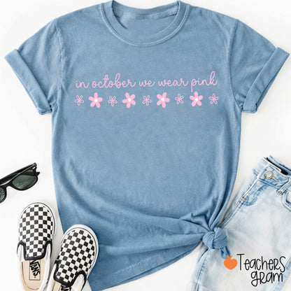 In October We Wear Pink Handwritten Script Daisy Floral Fall Teacher T-Shirt