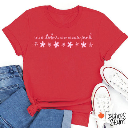 In October We Wear Pink Handwritten Script Daisy Floral Fall Teacher T-Shirt