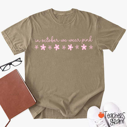 In October We Wear Pink Handwritten Script Daisy Floral Fall Teacher T-Shirt