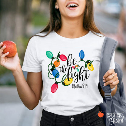 Be The Light Christmas Light Teacher T-Shirt