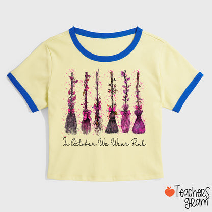 On Wednesday We Wear Pink Witch Broom Teacher Ringer T-Shirt