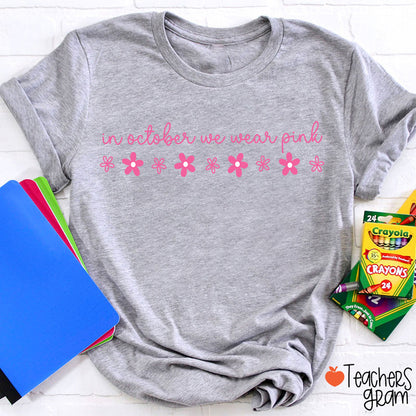 In October We Wear Pink Handwritten Script Daisy Floral Fall Teacher T-Shirt