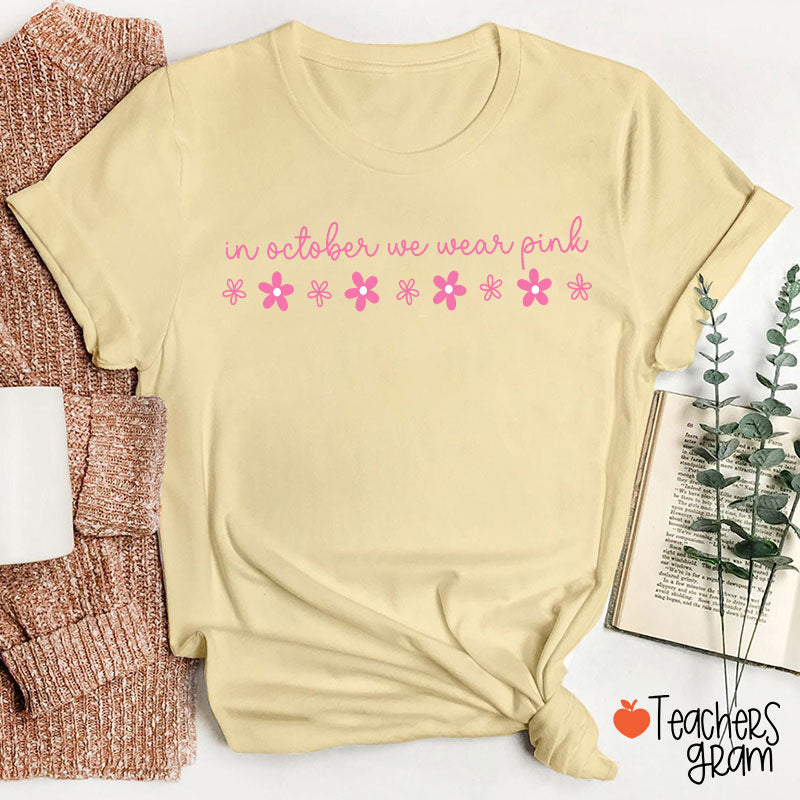 In October We Wear Pink Handwritten Script Daisy Floral Fall Teacher T-Shirt