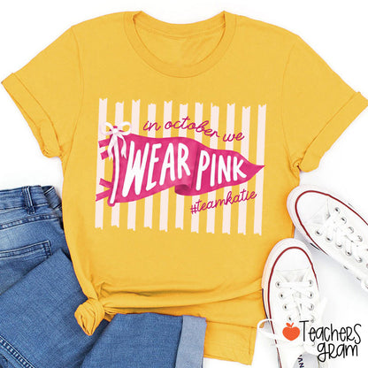 Personalized In October We Wear Pink Pink Stripe Flag Bow Teacher T-Shirt
