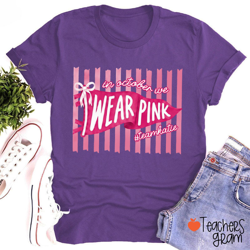 Personalized In October We Wear Pink Pink Stripe Flag Bow Teacher T-Shirt
