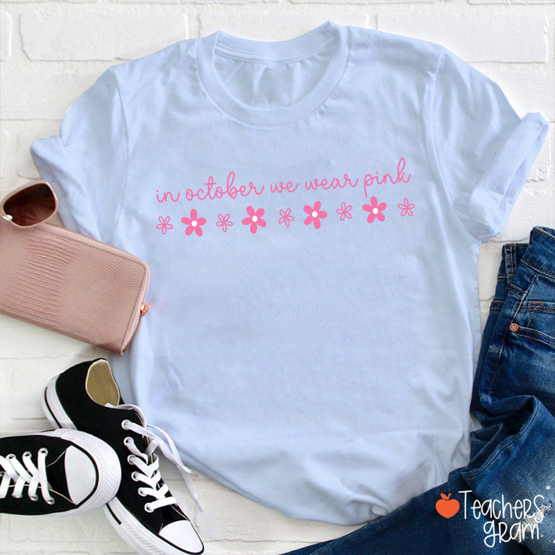 In October We Wear Pink Handwritten Script Daisy Floral Fall Teacher T-Shirt
