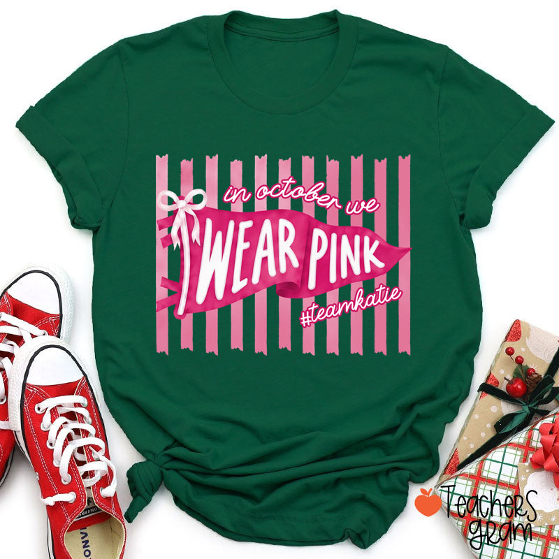 Personalized In October We Wear Pink Pink Stripe Flag Bow Teacher T-Shirt