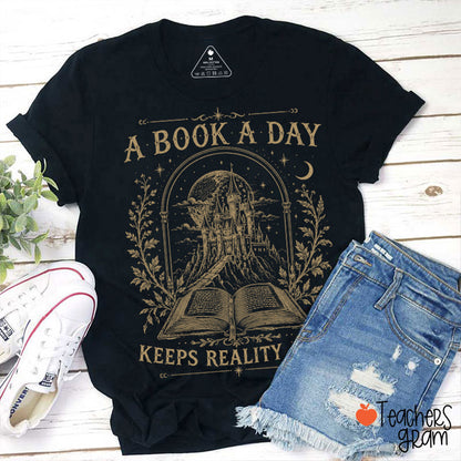 A Book A Day Keeps Reality Away Magic Castle Open Book Teacher T-Shirt