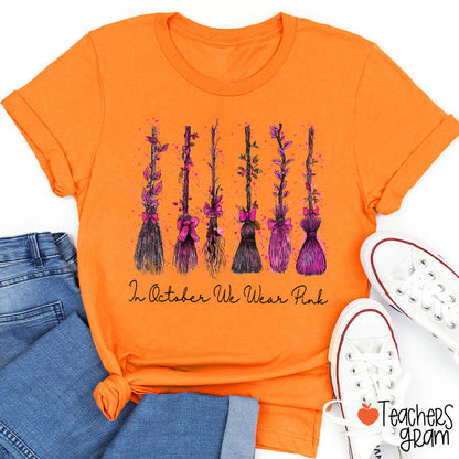 On Wednesday We Wear Pink Witch Broom Teacher T-Shirt