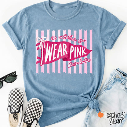 Personalized In October We Wear Pink Pink Stripe Flag Bow Teacher T-Shirt