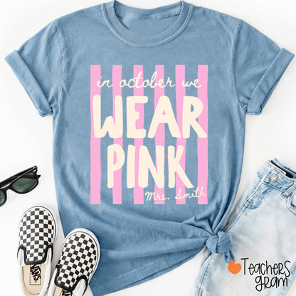 Personalized Name In October We Wear Pink Striped Teacher T-Shirt