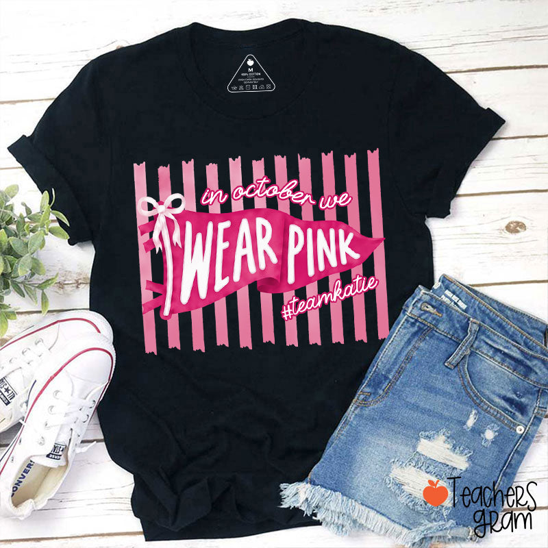 Personalized In October We Wear Pink Pink Stripe Flag Bow Teacher T-Shirt
