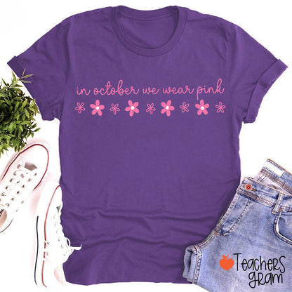 In October We Wear Pink Handwritten Script Daisy Floral Fall Teacher T-Shirt