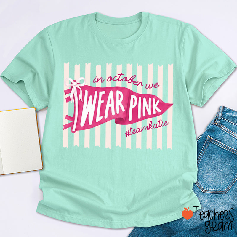 Personalized In October We Wear Pink Pink Stripe Flag Bow Teacher T-Shirt