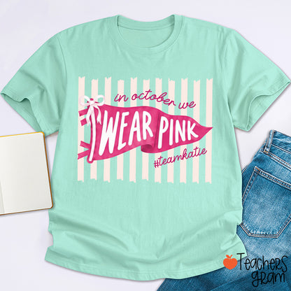 Personalized In October We Wear Pink Pink Stripe Flag Bow Teacher T-Shirt
