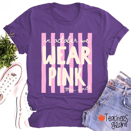 Personalized Name In October We Wear Pink Striped Teacher T-Shirt
