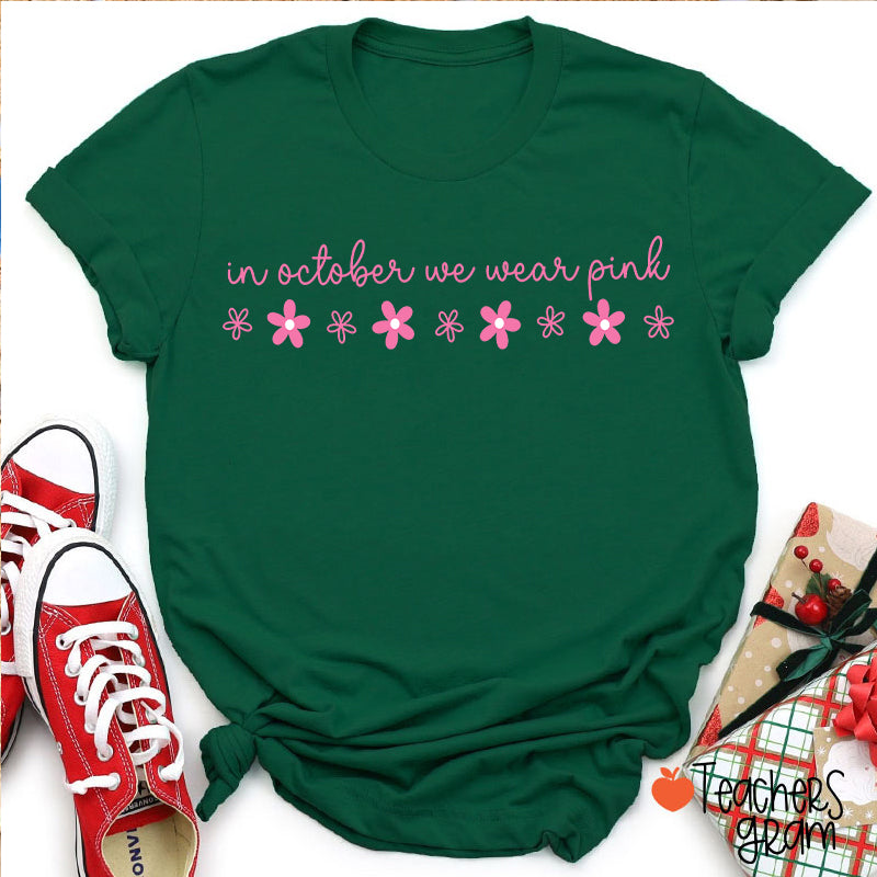 In October We Wear Pink Handwritten Script Daisy Floral Fall Teacher T-Shirt