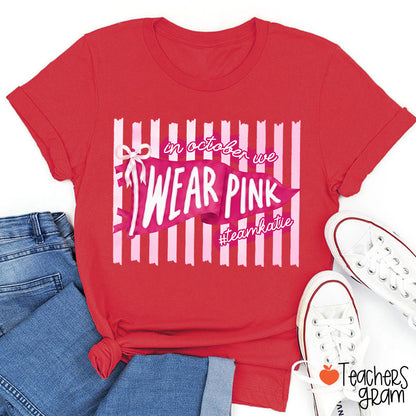 Personalized In October We Wear Pink Pink Stripe Flag Bow Teacher T-Shirt