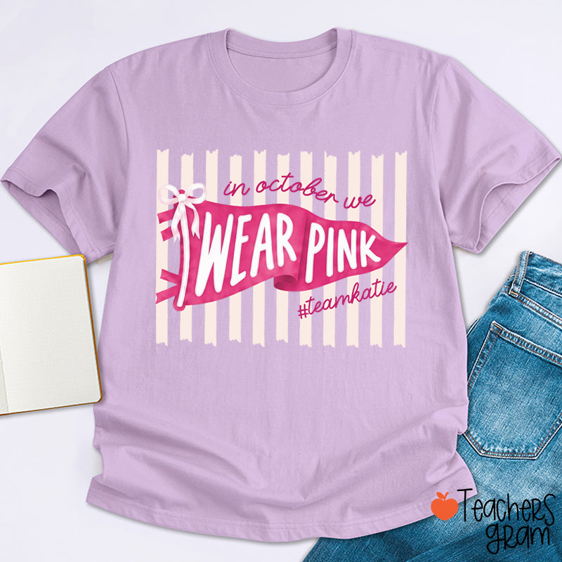 Personalized In October We Wear Pink Pink Stripe Flag Bow Teacher T-Shirt